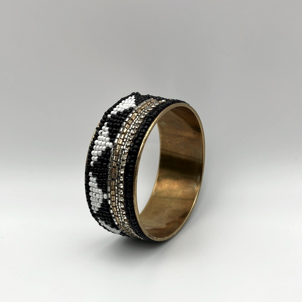 Elegant Beaded Bracelet in Black, White, and Brass vintage